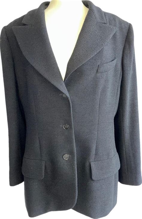 La petite veste noire wool blazer Chanel Black size 40 FR in Wool 